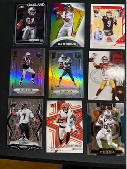 Box of assorted NFL trading cards. Pics are of some of what is in the box.