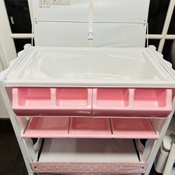 Baby diaper station with bath tub unit. 