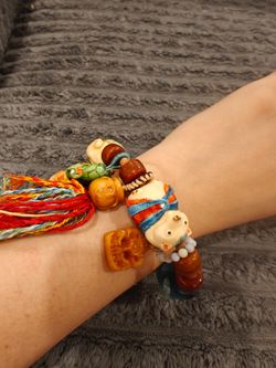 Handmade Eclectic Charm Bracelet with Ceramic Beads and Tassel