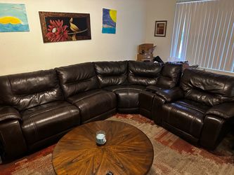 Brown leather sectional couch