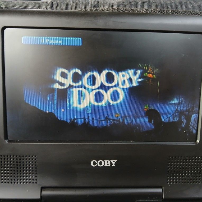 D v d player with charger. works as it should no issues