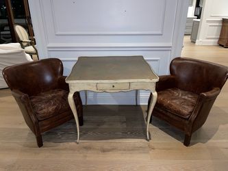 Pair of Brown vintage distressed brown leather club chairs