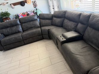 Gray Leather Reclining Sectional Sofa with Console