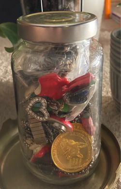 A JAR FULL OF JEWELRY JUNK