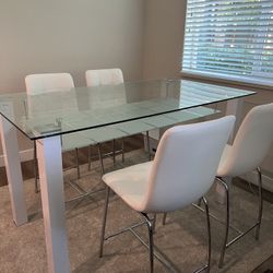 Modern Dining Table, 4 White Chairs; Contemporary Glass Countertop with Storage Shelf; LIKE NEW