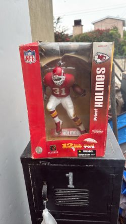 KC chiefs priest Holmes figure in box