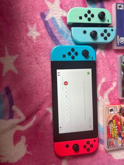 Nintendo Switch Bundle with 9 Games and Extra Joy-Cons