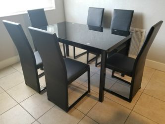 Black obsidian glass dining table new with 6 chairs 48x30 new