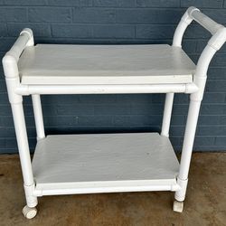 Hard plastic white rolling cart