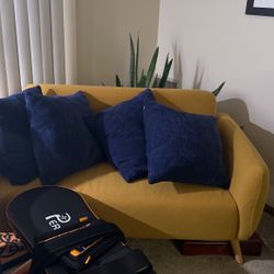 Two  Love Seats w/pillows and arm chair
