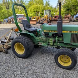 John Deere 650 Tractor with Finish Mower
