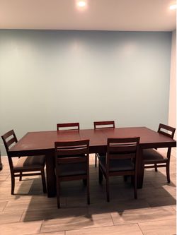 Ashley Furniture Cherrywood Formal Dining Table and six chairs