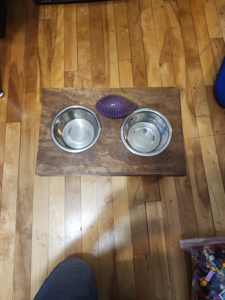 Homemade dog bowl stand with bowls And Ball