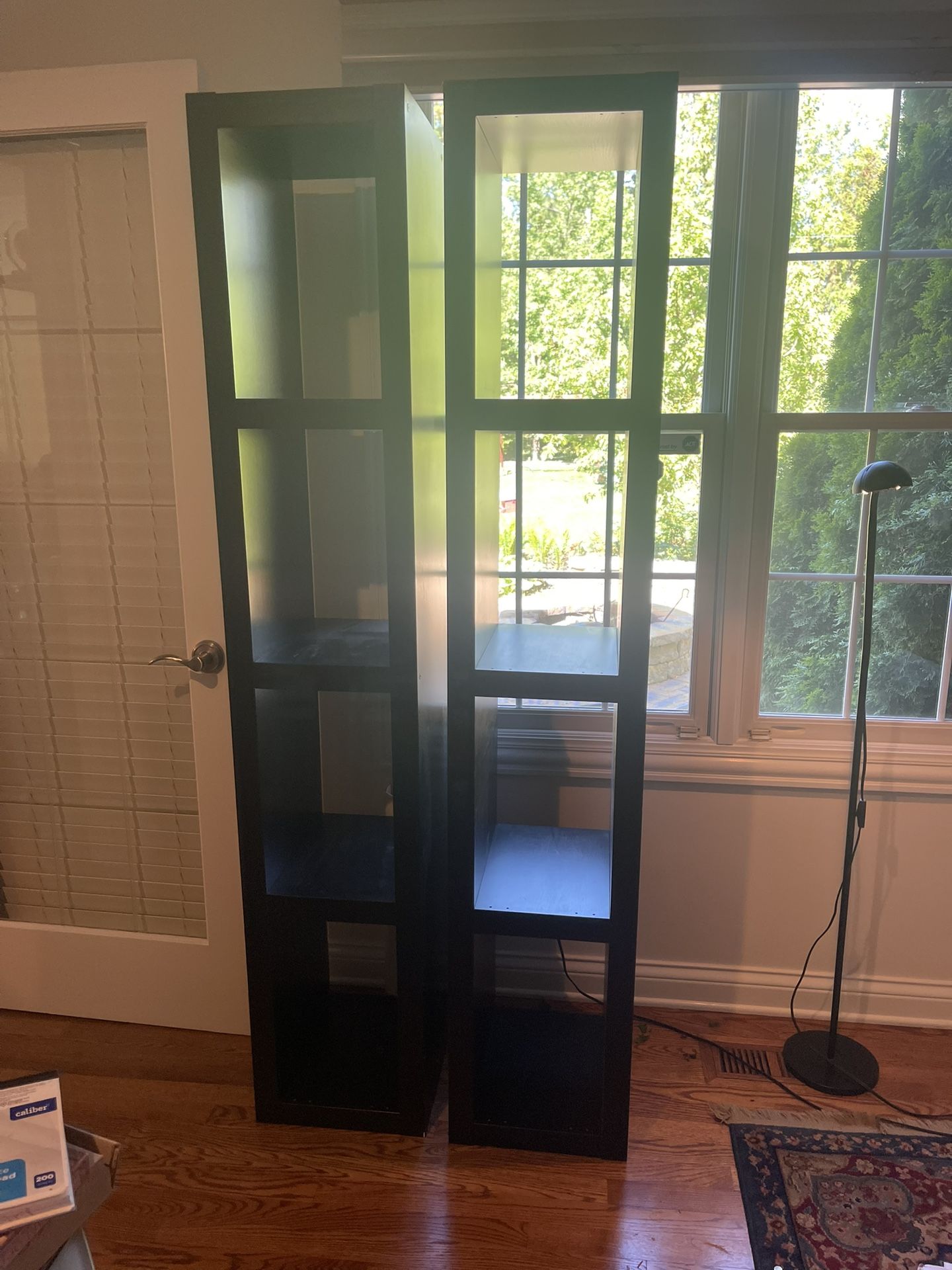 Two heavy-duty black bookshelves
