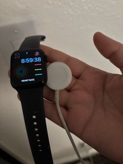 Apple Watch SE gen 2 with charger and band