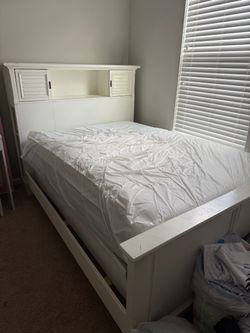 Full size bed with mattress and box spring