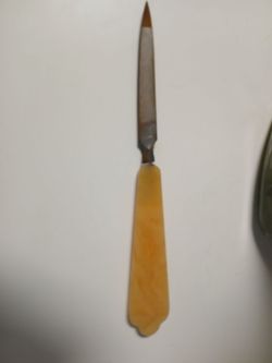 Vintage bake light or style  handle nail file