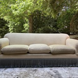 Custom Made Champagne Tone Sofa - Elegant Design, Rolled Arms, Skirted Bottom Trimmed With Fringe