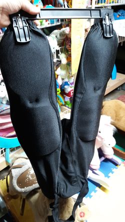 Used football pants size extra large they look like they might fit 5 to 10 yr