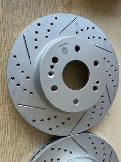 Chevy Silverado 1500 19-26 Front Double Drill Slot Geomet Rotors Ceramic Brake Pads