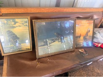 Antique photographs with glass and wooden frames
