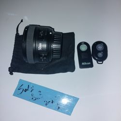 YONGNUO 50MM CAMERA LENS AND TWO REMOTES