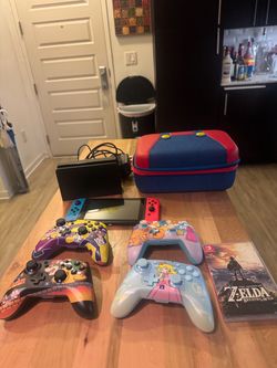Nintendo Switch V2 Bundle + Zelda + 4 Controllers + Case – $280 OBO