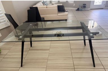 Heavy glass table with black frame