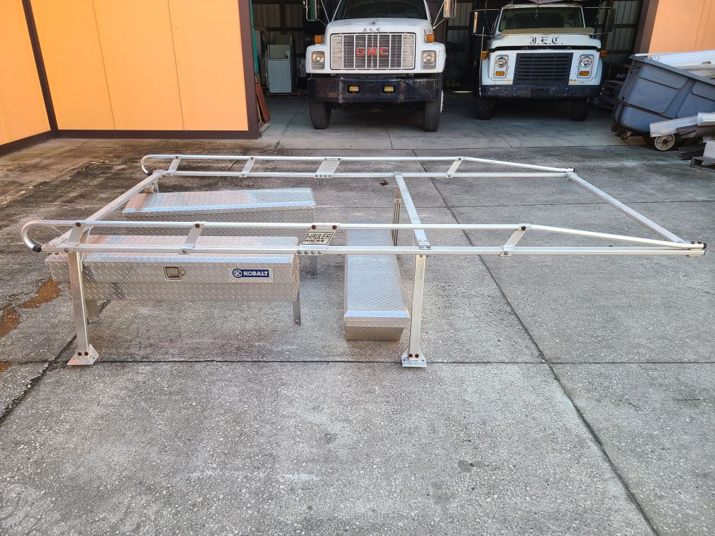 Aluminum ladder rack with toolboxes