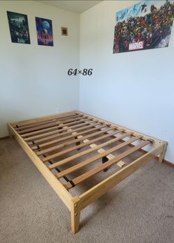 Wood frame with futon mattress