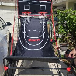 ESPN Pro Competition LED 2-Player Arcade Basketball game. 

Features a light-up LED backboard and an electronic scoreboard that tracks points and time