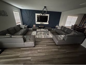 Set of 2 Sectional faux couches set of left and right and includes two ottomans