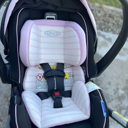 Pink And White Infant Car seat With Snap And Go Stroller. 