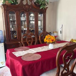 China Cabinet And Big Dining Table with Six Chairs Two Arm Chairs 