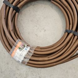 Earthline Brown
PC 100 ft.
1-GPH Pressure
Compensating Drip
Line with 18 in.
 Spacing 