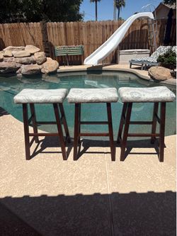 Three bar stools