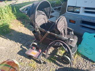 New Condition Double Stroller With Boogie Board