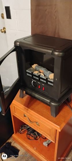 Illuminated fireplace heater