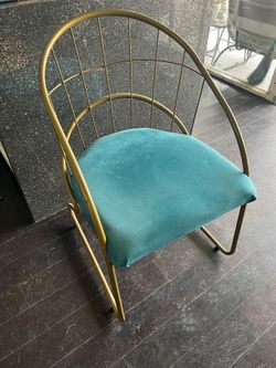 Gold metal barrel chair