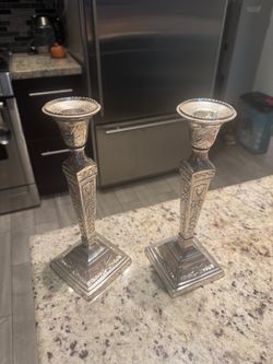 Pair of Silver-Tone Ornate Candlesticks