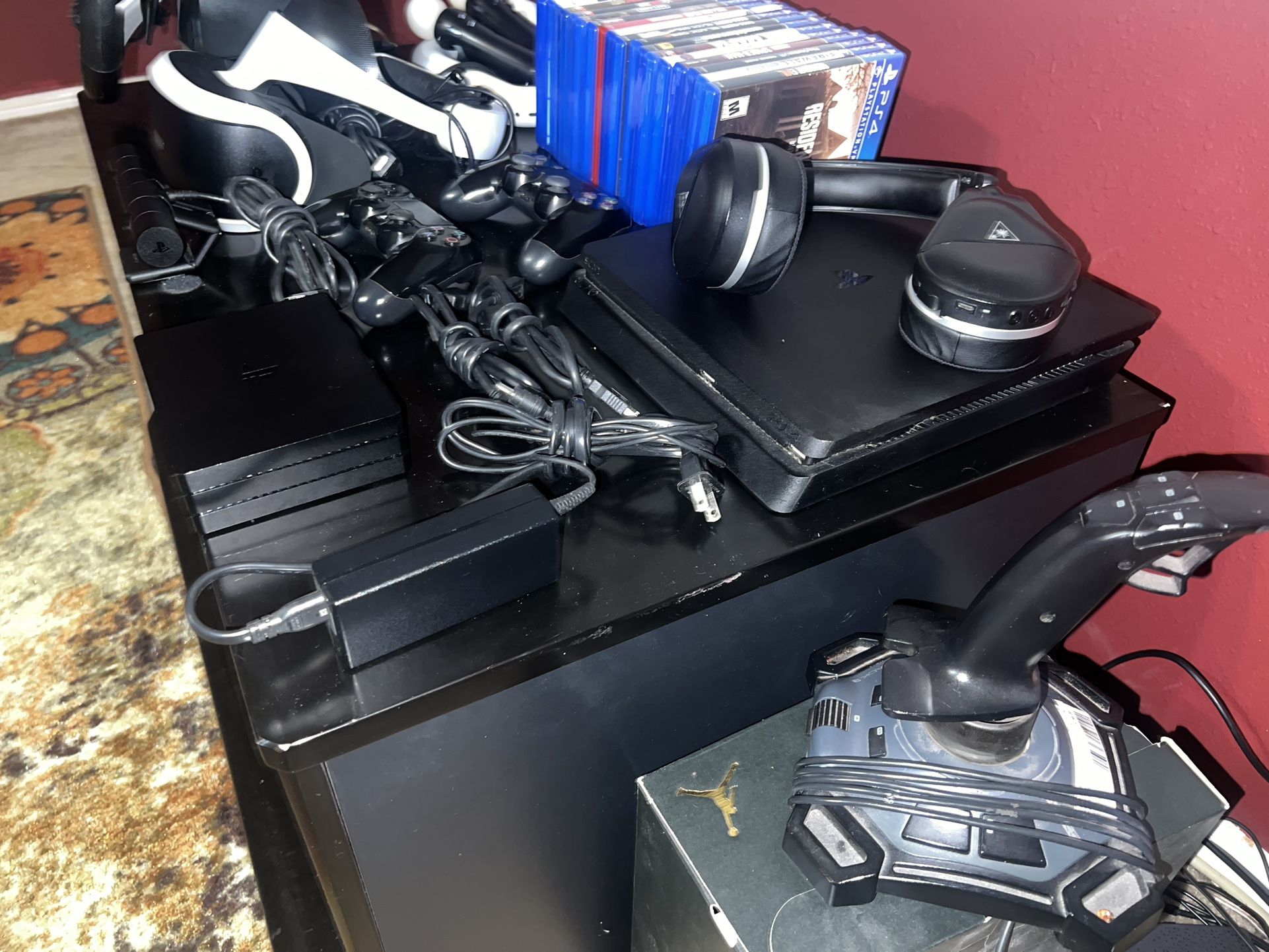 PS4 Gamer’s Bundle: Console, VR Headset, VR Gun, Camera, Wheel, Controllers, Games