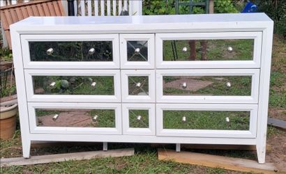 Dresser with mirror drawers