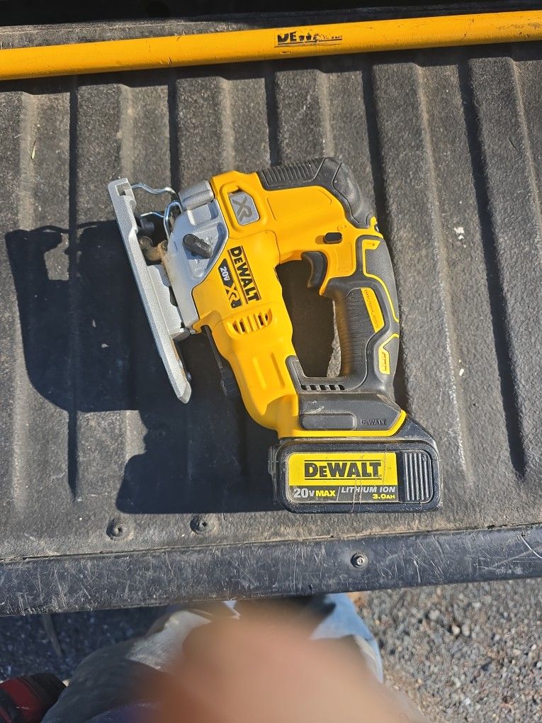 Jigsaw With Battery And Charger...reg 300...I'm Asking 150.00 As It Is Barely Used