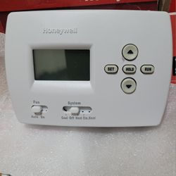 Honeywell PRO 4000 5-2 Day Programmable Thermostat (TH4210D1005).
