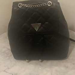 A Black Fancy Back Pack By Guess