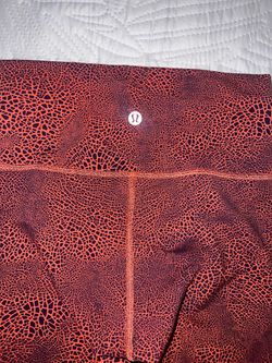 Lululemon orange abstract print leggings size 6