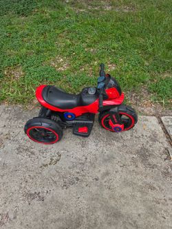 Lil' Rider red battery-operated electric trike motorcycle for toddlers