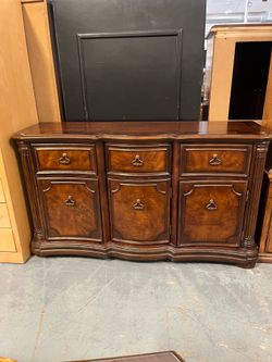 Dark brown buffet cabinet (in store)