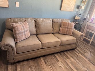 Beige 3-Seat Sofa with Nailhead Trim small scuff like new only one year olds
