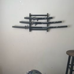 Set Of Swords And Set Of Club Speakers
